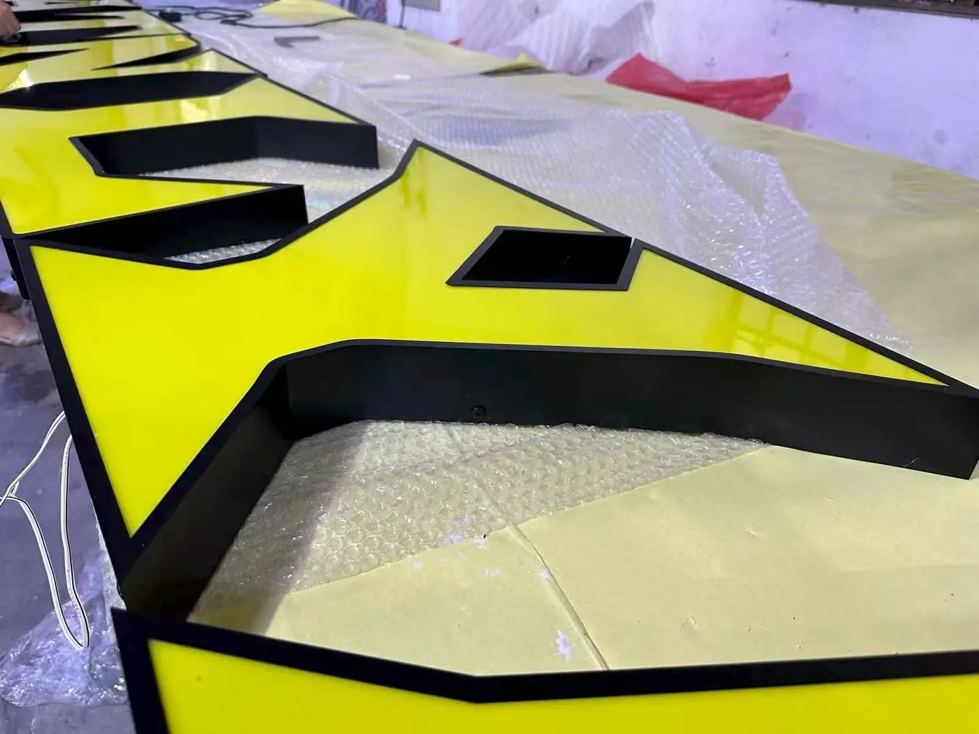 Installed gold backlit logo
